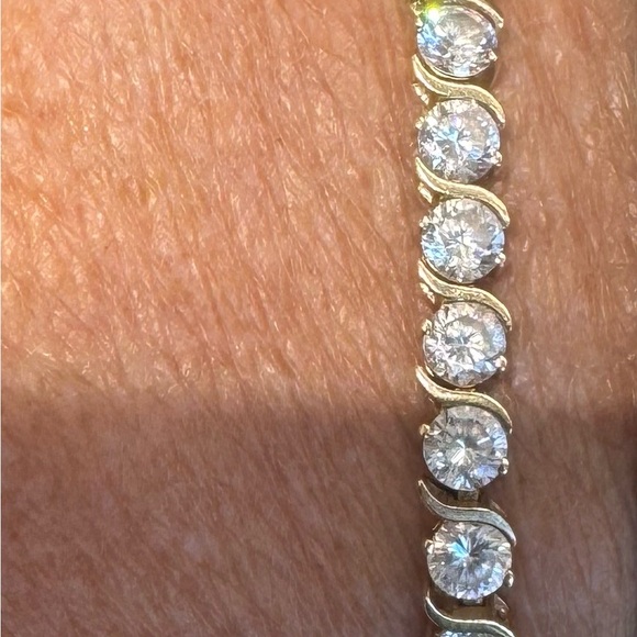 Elegant Gold 14k and CZ tennis bracelet.
